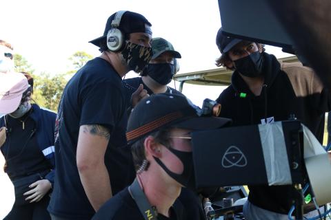 Sunshot by Grayson Williams The crew of “The Green,” a television pilot being filmed at Cateechee in Hartwell this week film a scene at the golf course on Tuesday, Sept. 22. Pictured are Wesley Cox, left, Justin Sterner, middle back, James McShane, right, and McKinley Benson, bottom. 