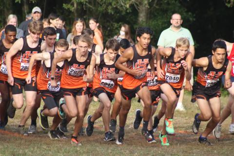 Sunshot by Grayson Williams The Hart County boys cross country team starts the race hosted by Hart County High School on Tuesday, Sept. 22. 