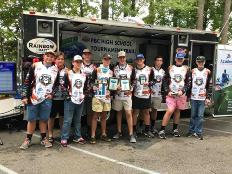 The team poses for a photo.