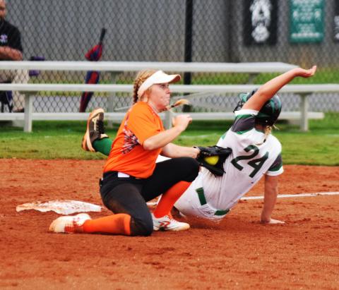 hoto by Shane Scoggins/Franklin Co. Citizen-Leader - Gabby Buffington tags a Franklin County base runner at third base on Sept. 24 in Carnesville.
