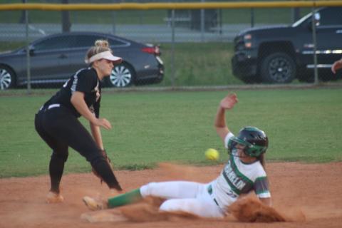 Sunshot by Grayson Williams - Hart County’s Anslee Mitchell fields a throw in an attempt to get a Franklin County base runner out on Sept. 3 in Franklin County.