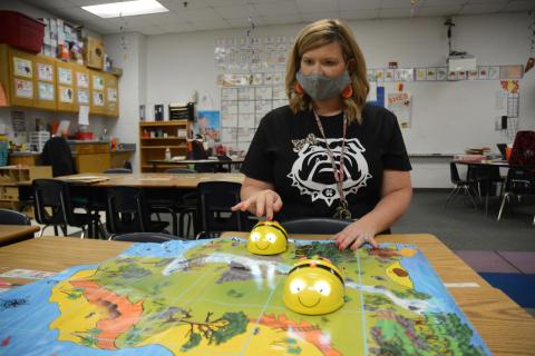 Sunshot by Michael Hall - Sommer Morris shows how to program Bee-Bots at South Hart Elementary recently. The bots were purchased using money she earned through a Hart EMC Bright Ideas Grant. 