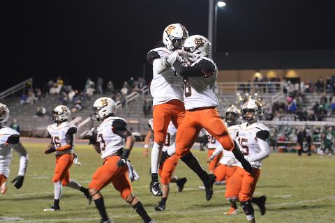 Players celebrate a big play in the 2019 win by the Bulldogs over the Franklin County Lions. The two teams will meet for this year's game on Friday, Oct. 16.