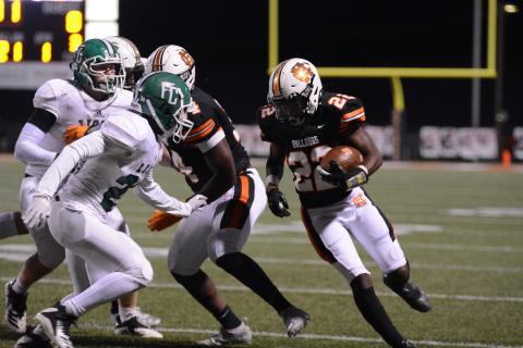 Sunshots by Grayson Williams Running back Nori Moore prepares for contact with a Franklin County defender on Friday, Oct. 16, at Herndon Stadium in the Bulldogs’ homecoming victory over the Lions. 