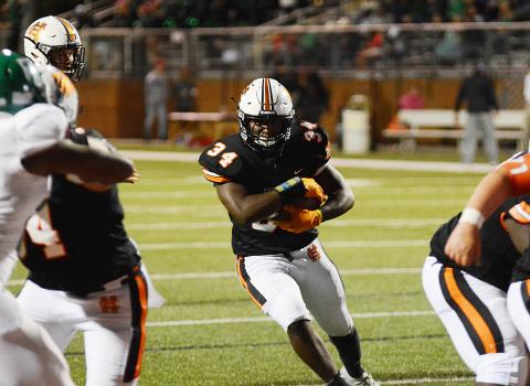Hart County running back J.L. Lackey finds a hole to run through last week against Franklin County at Herndon Stadium.