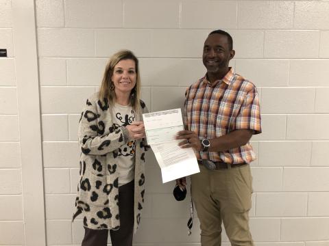 Pictured are seventh-grade math teacher at Hart County Middle School, Tommy Hughes, and principal Jacqueline Brock accepting the grant on behalf of the STEAM committee.