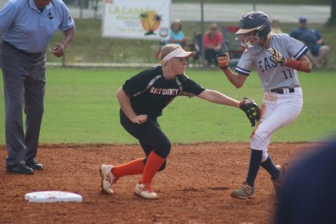 Sunshots by Grayson Williams Gabby Buffington tags an East Jackson runner out during the Lady Diamond Dogs’ victory in the Region 8-AAA tournament on Monday. 