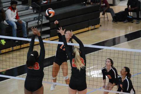 Dakota Phillips spikes the ball during the Volleydogs match Tuesday, Oct. 20 at Hart County High School. 