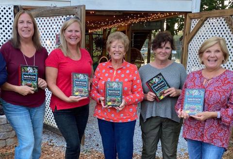 Photo submitted - Hartwell Service League members from left to right, Dixie Northrup, Suzee Northrup, Kay Cleveland, Debra Kennedy and Beth Mewborn, show off the service league’s cookbook, now on sale. 