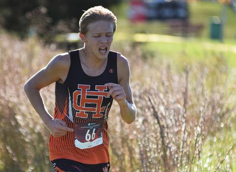 Hart County Runners Zachary Peters and Melody Blomberg run in the Region 8-AAA cross country meet last week. 