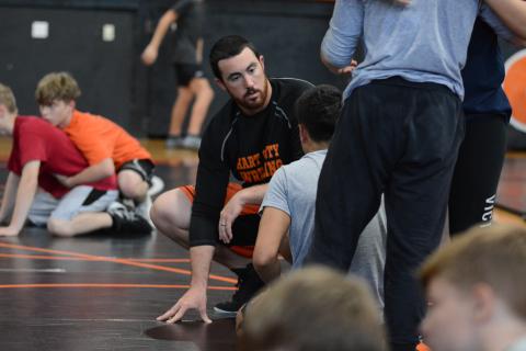 Sunshot by Grayson Williams - Head coach Sean Gaddy coaches up a wrestler at practice on Thursday, Nov. 5 at Hart County High School.