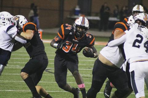 J.L. Lackey looks for running room against East Jackson in 2019.