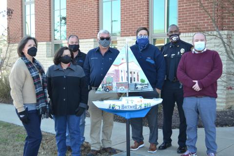 Sunshot by Drew Dotson - Pictured from left to right are Angela Short, Debbie Gurley, Dennis White, Ken Lystiuk, Jon Herschell, Anthony Davis and Jason Ford.