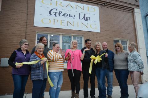 From left to right, TORCH board of directors members Nancy Butler, Mary Gidley and Joe Hoffman, Glow Up partners Laura McCarty and Jessica Fortson, Downtown Café owner Sharif Farhan and manager Melissa Dove, Hartwell city councilman Tray Hicks, Lake Hartwell Insurance’s Elizabeth Brewer and Winnie J’s owner Winnie Sullivan celebrate the ribbon cutting for Glow Up Tanning Salon, 47 Depot Street in downtown Hartwell. 