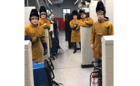  Photo submitted — Hart County High School welders who earned their technical college certification in welding through a class taught by Mike Carey at Hart College and Career Academy pose for a photo recently.