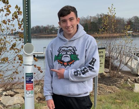 Photo submitted — Dawson Carden shows off one of the monofilmanet recycling stations he has placed at boat ramps around Lake Hartwell. 