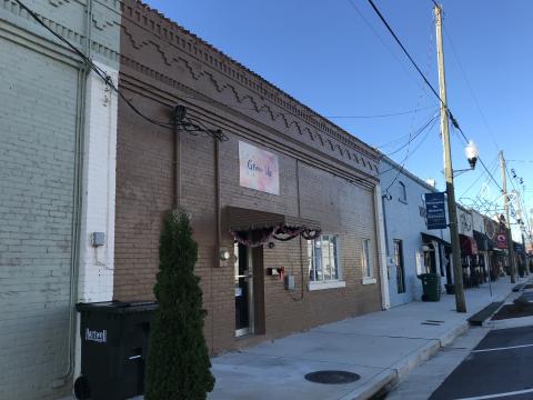 Sunshot by Drew Dotson - The exterior of Glow Up Tanning Salon is shown on Depot Street in downtown Hartwell. 