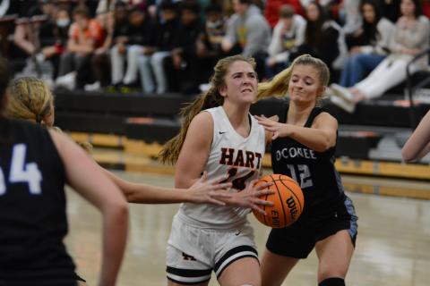Sunshot by Grayson Williams - Dakota Phillips powers through Oconee County Defenders at Hart County High School on Friday, Jan. 22.