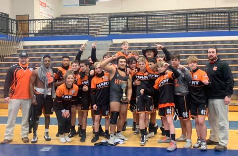 Photo by Mandy Patton - The Hart County High School wrestling team celebrates the school’s first region championship in duals wrestling in school history on Jan. 16 at Oconee County High School.