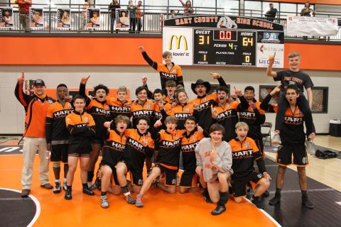 The Hart County Mat Dogs celebrate their victory over Murray County and Lumpkin County in the state wrestlig duals preliminary tournament on Saturday, Jan. 23, at Hart County High School, earning them a berth in the state duals tournament this coming Saturday at Cherokee Bluff. Winning sectionals puts the Mat Dogs among the final eight duals teams in the state. 