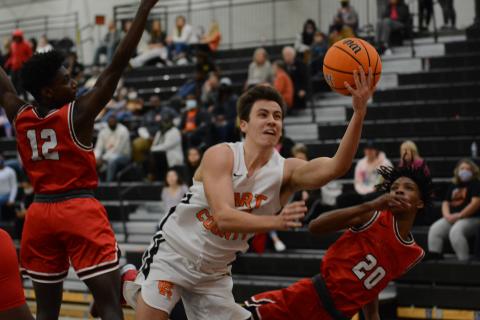 Sunshot by Grayson Williams - Ethan Spagnoli puts up a shot against Stephens County at Hart County High School on Tuesday. 