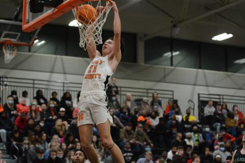Sunshot by Grayson Williams - J.C. Curry throws down a dunk last week at Hart County High School in the Bulldogs’ win over rival Franklin County to finish an undefeated season in Region 8-AAA play. 