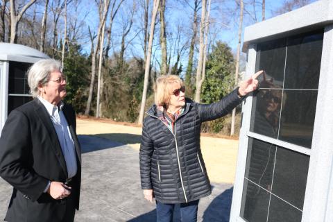 Walter Gordon, left, and Nancy Hardigree, right, look at the new columbarium at Northview Cemetery placed there as part of a beautification project at the historic cemetery. 