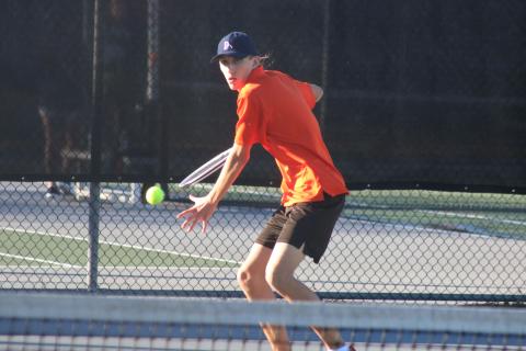 C.J. Jorensen returns a volley during a match against Habersham Central on Monday, Feb. 22, at HCHS.
