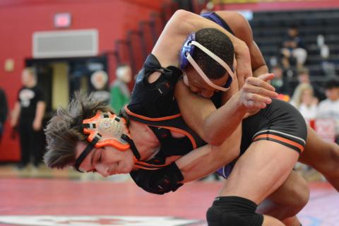 Sunshot by Grayson Williams Zander Bradsher tries to bring down a Monroe Area opponent on Saturday, Feb. 6, at Stephens County High School in the Region 9-AAA traditional wrestling tournament. 