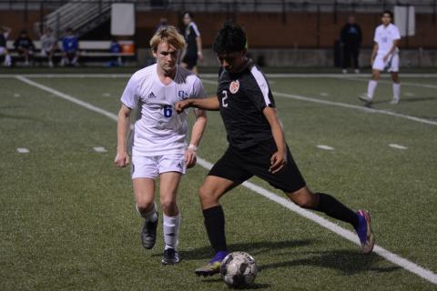 Sunshot by Drew Dotson - Alejandro Rangel kicks the ball at Hart County High School on Friday, March 12, in Hart County’s loss to Oconee County. 