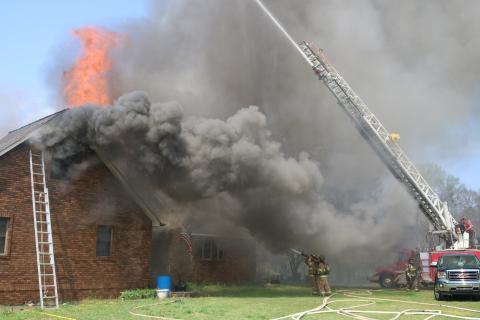 Sunshot by Grayson Williams - A house fire on Goldmine Holly Springs Road destroyed a residence after fire crews battled back flames for more than eight hours on Friday, March 26.