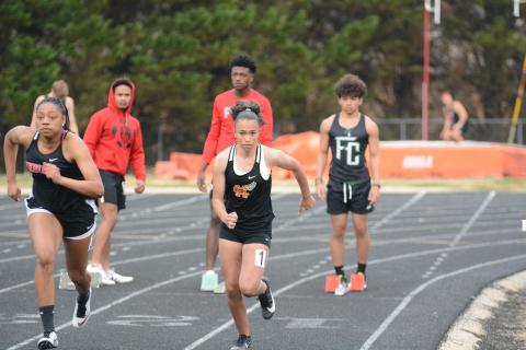 Kiera Jester competes in the 100-yard dash in the girls’ track team’s 1st-place finish. 