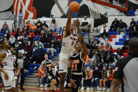 Sunshots by Grayson Williams - Hart County’s Shone “Spudd” Webb is blocked in a layup attempt on Friday, March 5, by Sandy Creek’s Jabari Smith, who is committed to play at Auburn in college. 