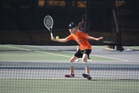 Sunshot by Grayson Williams No. 1 singles player C.J. Jorensen returns a volley against Franklin County on March 18 at Hart County High School.