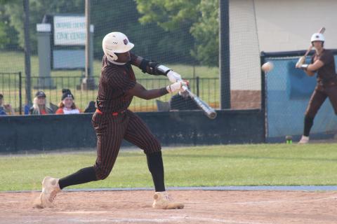 Sunshot by Grayson Williams - Paul Davis makes contact with a pitch on Friday, April 23 against Oconee County in Watkinsville.