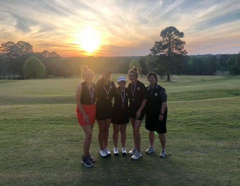 Photo submitted Pictured from left to right are Hart County High School girls’ golf team members Ashlyn Stanton, Mary Elizabeth Jackson, Lauren Weaver, Ella Franklin and head coach Wende Peloquin at the area tournament on Monday in Monroe.
