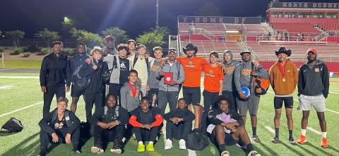 The Hart County High School boys track team is pictured holding a second-place plaque at the North Oconee Titan Invitational.