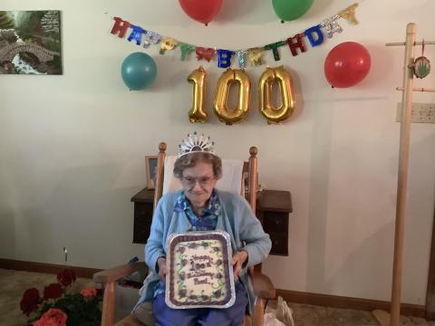 Submitted photo - Longtime area resident Pearl Bond celebrates her birthday with a cake from her friends who threw her a neighborhood party attended by about 30.