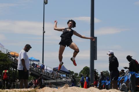 Marcus Etienne/ The Toccoa Record - Hart County’s J.C. Curry soars through the air during a field event in the sectional tournament at East Jackson on May 8.