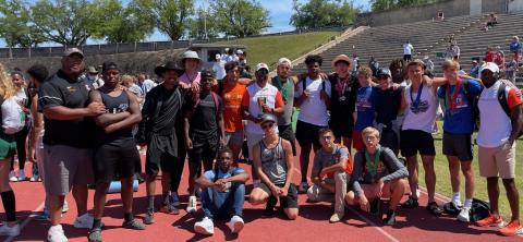 Photo submitted The Hart County boys’ track and field team poses for a photo with its third-place state trophy in Albany. Pictured from left to right are, top row, assistant coach Kendell Rucker, Trez Fouch, Jesse Chlenker, Justin Coker, Quinn Moore, Ty Shiflet, head coach Floyd Ramsey, Damian “D-Rock” Tyler, Kanye Fouch, J.C. Curry, Dominic Dutton, Cole Risner, A.J. Johnson, Chandler Smith, assistant coach Tevin Glaze, bottom row, Johnny Curry, Andrew Brezeale, Diego Martinez and Zachary Peters.
