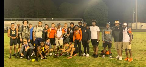 Photo submitted The Hart County High School boys’ track team is pictured with the Region 8-AAA trophy after taking the title in Monroe last week.