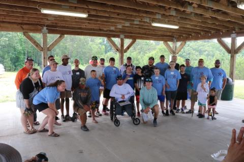 Sunshot by Grayson Williams - Participants and volunteers for Lake Hartwell’s first-ever CAST for Kids event pose for a photo after an awards ceremony on Saturday, June 6 at Gum Branch Mega Ramp in Hartwell.