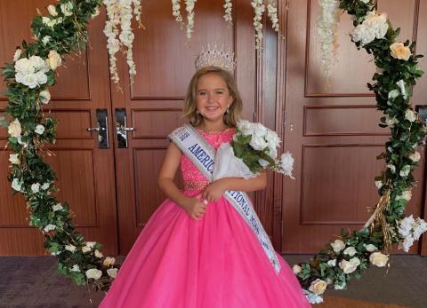 Submitted photo - Andie Jane Holmes grins after being crowned ‘National Young Miss in Atlanta on June 12.