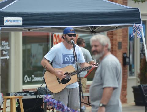 File photo - Musician Phil Duncan entertains Hartwell during the 2019 Pre-Fourth festival.