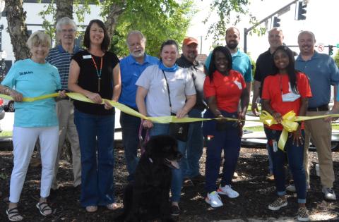 Drew Dotson/The Hartwell Sun Local government officials and sponsors cut the ribbon, dedicating the new picnic tables at the Hartwell courthouse.