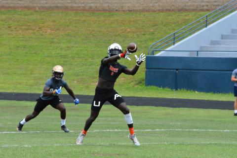 Drew Dotson/The Hartwell Sun - Paul Davis catches a pass in the semi-finals of the 7-on-7 camp in Cleveland against St. Pius X Catholic School.