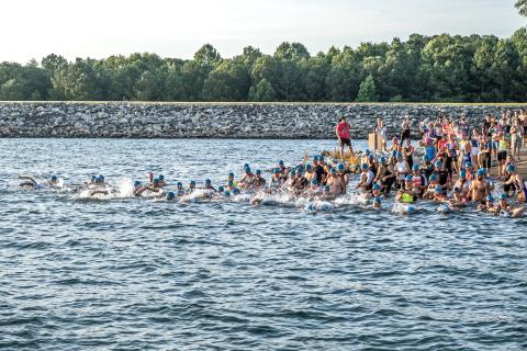 Bill Powell/The Hartwell Sun - Triathletes jump in at Big Oaks  Recreation Area on Lake Hartwell.