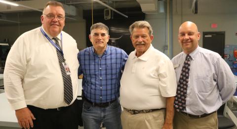 Photo submitted Pictured left to right: Hart County superintendant Jay Floyd, Congressman Andrew Clyde, Ga. Rep. Alan Powell and Career Academy CEO Brooks Mewborn pose for a photo at the  Hart College and Career Academy.	 