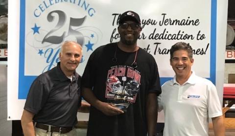 Pictured left to right: Randy Banister COO, Jermaine Gaines, and Bill Wild CEO.