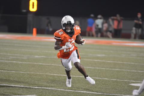 Drew Dotson/The Hartwell Sun - Sophomore running back Nori Moore finds space on the outside in Hart County’s first half against BHP.